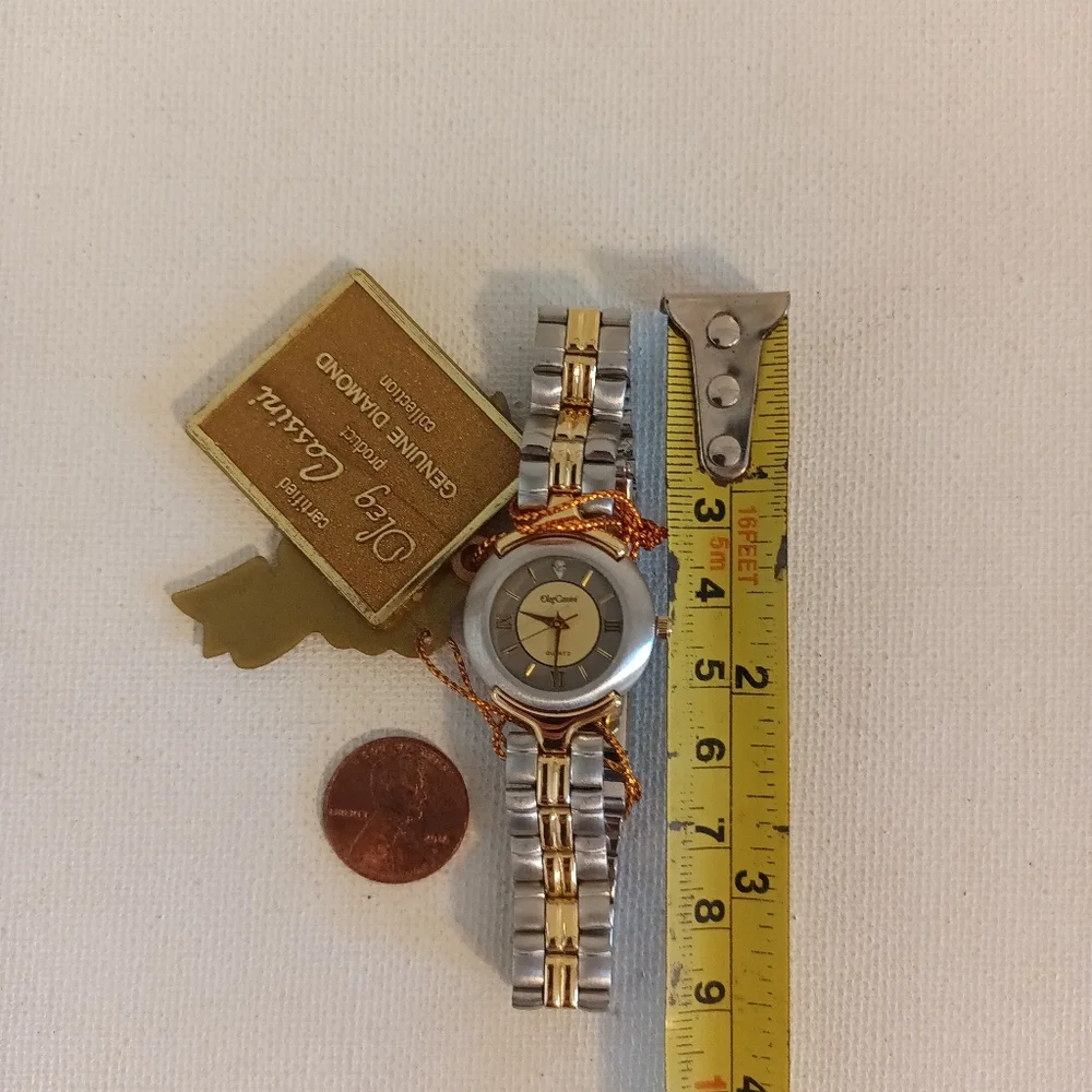 Oleg Cassini Vintage NIB genuine diamond watch two toned gold and silver